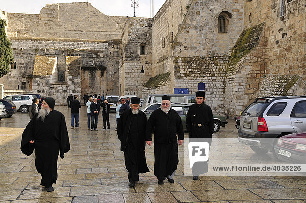 Monks in front of the Chapel of the Nativity of Christ in Bethlehem  West Bank  Israel  Middle East  the Orient