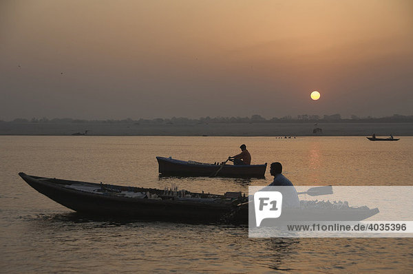 Sunrise over the Ganges river  boats  Varanasi  Benares  Uttar Pradesh  India  South Asia
