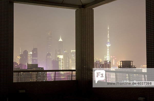View of the Pudong skyline from a roof terrace  night shot  Shanghai  China  Asia