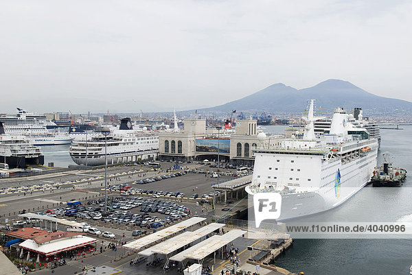Ferry in the harbour at the quay  behind it Vesuvius  Beverello  Naples  Campania  Italy  Europe