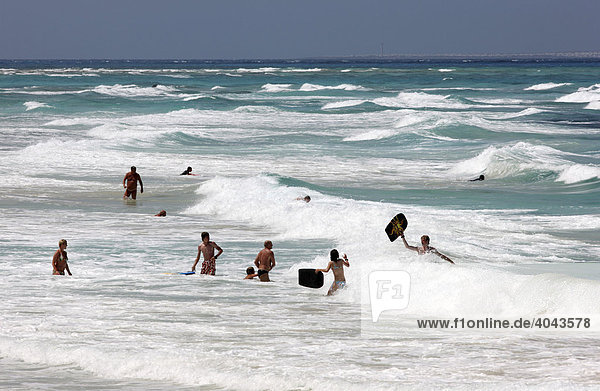 Bathers at a beach  Playa de los Matos  near Corralejo in the north of the island of Fuerteventura  Canary Islands  Spain  Europe