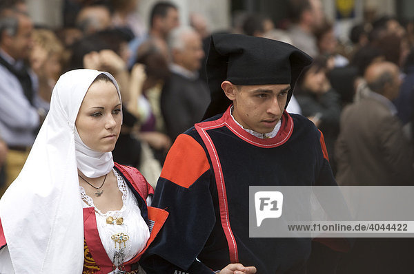 Couple wearing traditional costumes at Cavalcata Sarda Festival in Sassari  Sardinia  Italy  Europe