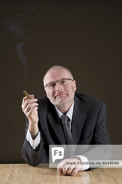 Businessman with a cigar