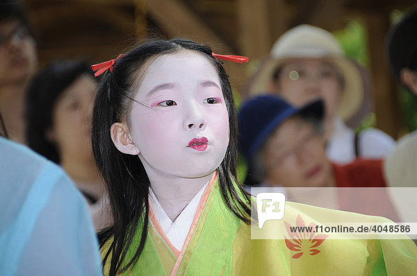 Girl of the royal household of the Saio dai  the central character of the Aoi Matsuri  Aoi Festival  Kyoto  Japan  Asia