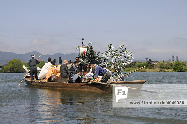 Procession in a boat  crossing the Katsura River  Matsuri shrine festival of the Matsuo Taisha Shrine  shintoism  Kyoto  Japan  Asia