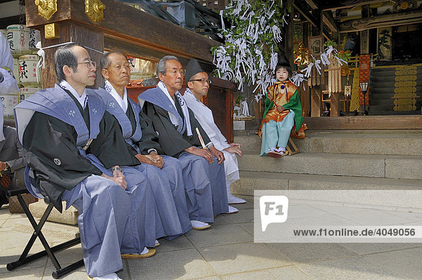 Japanese in traditional costume at the Matsuri Shrine Festival of the Matsuo Taisha Shrine  Shinto  Kyoto  Japan  Asia