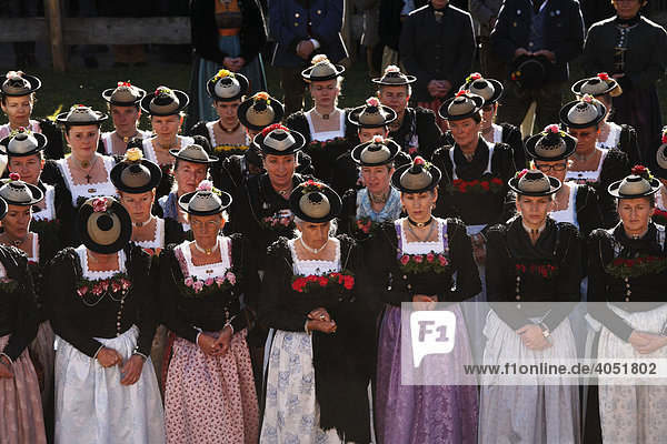 Women wearing traditional costumes during mass on Leonhardifahrt  the feast day of Saint Leonard of Noblac  Kreuth  Tegernsee Valley  Upper Bavaria  Germany  Europe