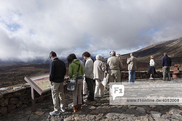 Tourists at a viewpoint in Canadas del Teide National Park  Tenerife  Canary Islands  Spain  Europe