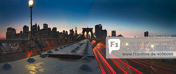 Panoramic view of Brooklyn Bridge and Manhatten by night  New York City  New York  USA  North America
