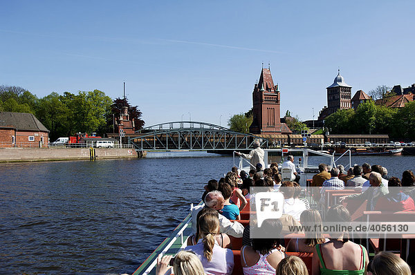 Harbour tour in Luebeck  Hebebruecke Bridge in the back  Luebeck  Schleswig-Holstein  Germany  Europe