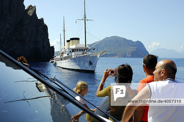 Day tourists on a tour ship visiting the volcanic island of Basiluzzo  Aeolian or Lipari Islands  Tyrrhenian Sea  South Italy  Italy  Europe