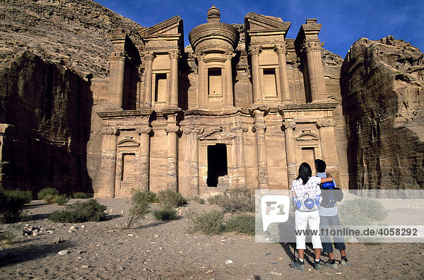 Tourists standing outside the Ed Deir Monastery  Petra  Jordan  Middle East