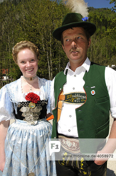 Couple wearing traditional clothes during a folk festival in Ruhpolding,  Chiemgau, Bavaria, Germany, Europe