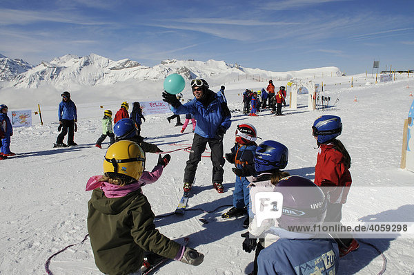 Children's ski circus on the Mt Maennlichen  Grindelwald  Bernese Alps  Switzerland  Europe
