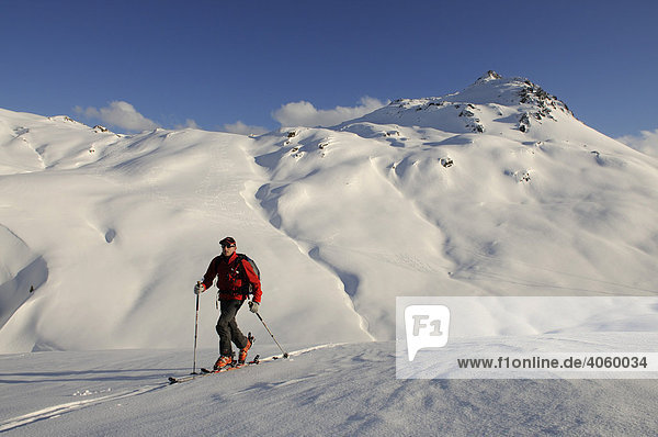 Ski hiker on a tour up Mount Tristkopf  Kelchsau  Tyrol  Austria  Europe