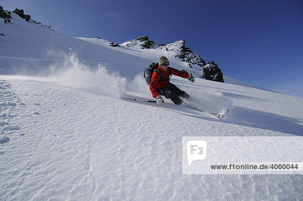 Ski wanderer on ski tour at Tristkopf  Kelchsau  Tyrol  Austria  Europe