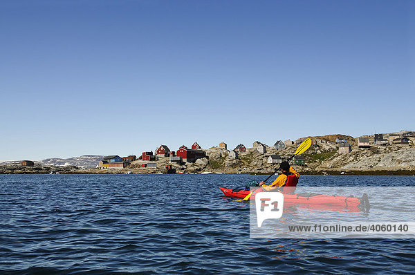 Kayaker near Tineteqilag  Ikasartivaq Fjord  East Greenland  Greenland