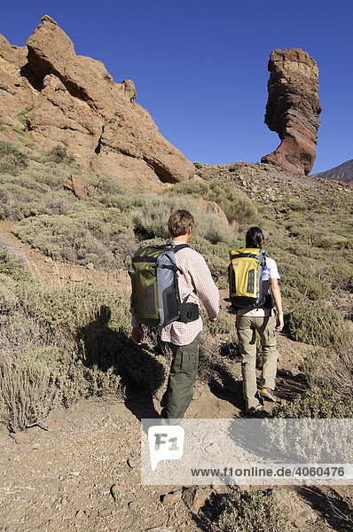 Hikers at the Roques de Garcia  Teide National Park  Tenerife  Canary Islands  Spain  Europe