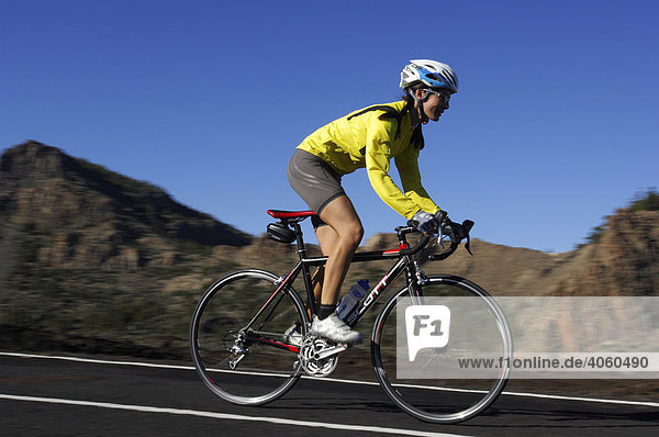 Racing cyclist in the Teide National Park  Tenerife  Canary Islands  Spain  Europe