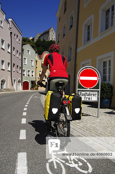 Cyclist in Burghausen am Inn  Chiemgau  Bavaria  Germany  Europe