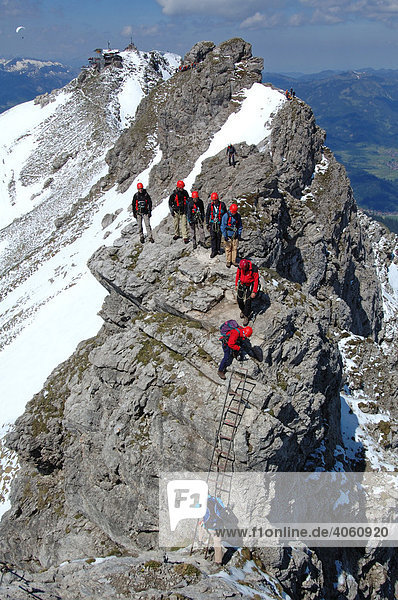 Rock climbers on Hindelanger climbing route  Oberstdorf  Allgaeu  Bavaria  Germany  Europe