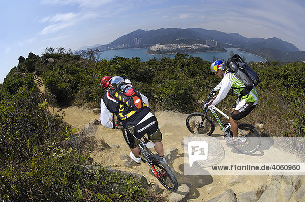 Mountain bikers near Stanley Bay  Hong Kong Island  Hong Kong  China  Asia
