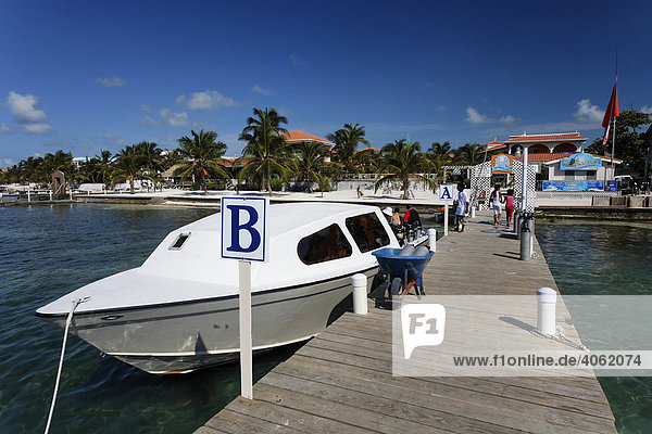 Scuba diving boat tied to the pier of the Sun Breeze Hotel  San Pedro  Ambergris Cay Island  Belize  Central America  Caribbean
