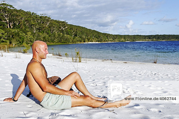 Man on the beach at Lake McKenzie  Fraser Island  Queensland  Australia