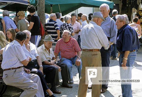 People talking  market in Panzano  Chianti  Florence  Firenze  Tuscany  Italy  Europe