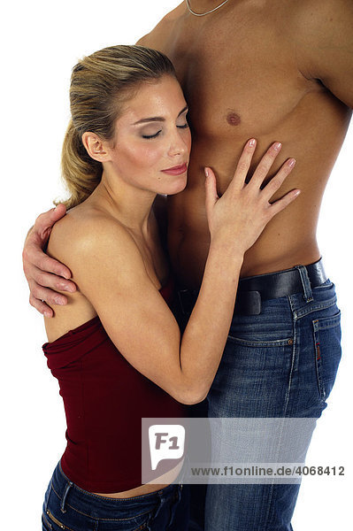 Woman leaning against man's chest