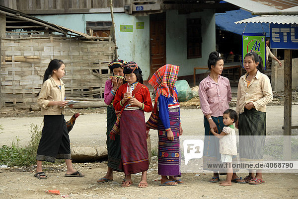 Women of the Tai Dam ethnic group wearing traditional dress  Muang Mai  Phongsali Province  Laos  Southeast Asia