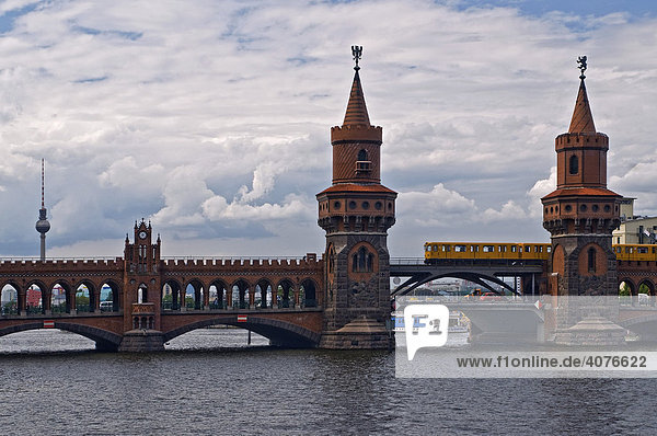 Obaumbruecke Bridge with the S-Bahn suburban railway in the back the television tower Berlin Germany Europe
