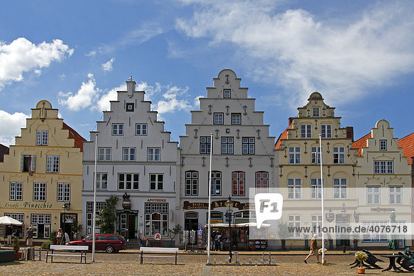 Historic houses at the market square of Friedrichsstadt  crow-stepped gable houses  Dutch stores  Friedrichstadt  Northern Frisia  Schleswig-Holstein  Germany  Europe