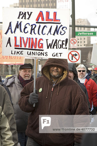 Auto workers rally outside the North American International Auto Show  calling for solutions to the industry's crisis that don't unfairly blame workers for failed corporate policies  Detroit  Michigan  USA