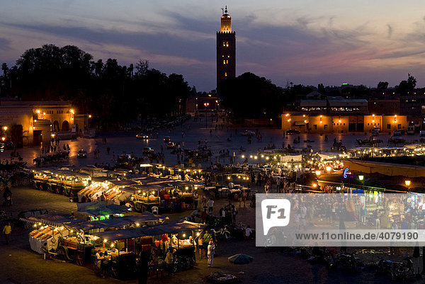 Main square Djemna El Fna with Koutoubia mosque at sunset in Marrakech  Morocco  Africa