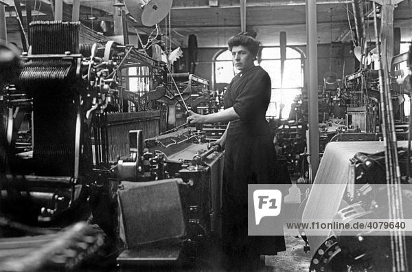 Historic photograph  woman working on a loom