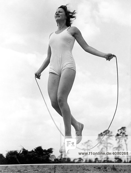 Historical image  woman jumping rope  ca. 1940