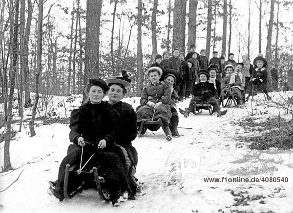 People riding sledges  historic photograph  around 1918