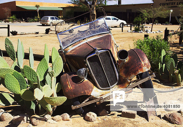 Rusted convertible vintage car  junked car in Solitaire  Namibia  Africa
