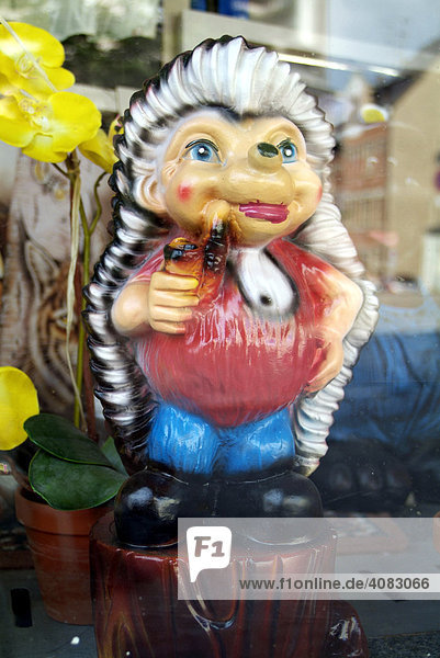 Eastgermany GER Germany: Tasteless shop window with different garden gnoms.