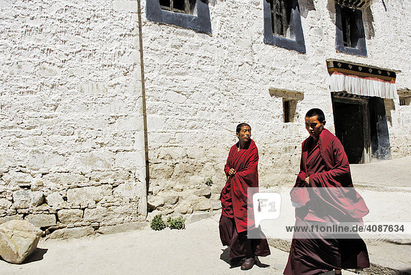 Two young monks of Drepung monastery  literally Rice Heap monastery  Tibet