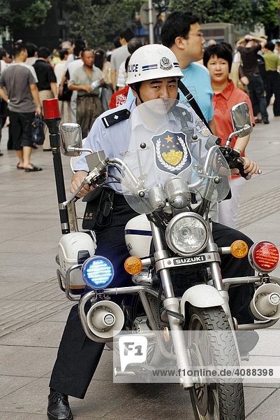 Traffic policeman on a motorbike  Shanghai  China  Asia