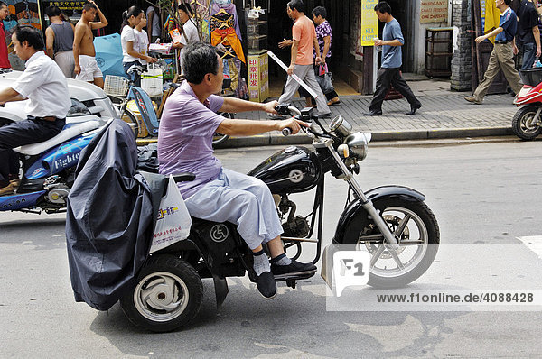 Street in the old part of Shanghai  motor-driven three wheeler for handicapped persons  Shanghai  China  Asia