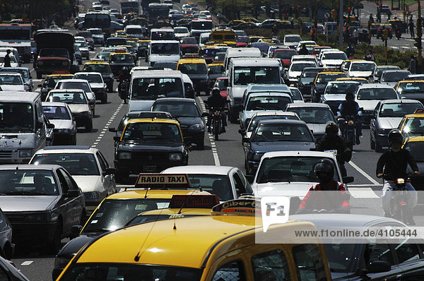 Heavy traffic during the rush hour on the widest avenue of the world  Avenida 9 de Julio  Buenos Aires  Argentina.