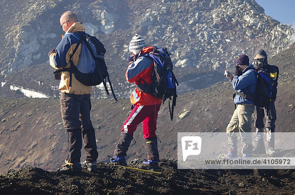 Hikers on crater rim of Volcano Villarrica  Pucon  Patagonia  Chile