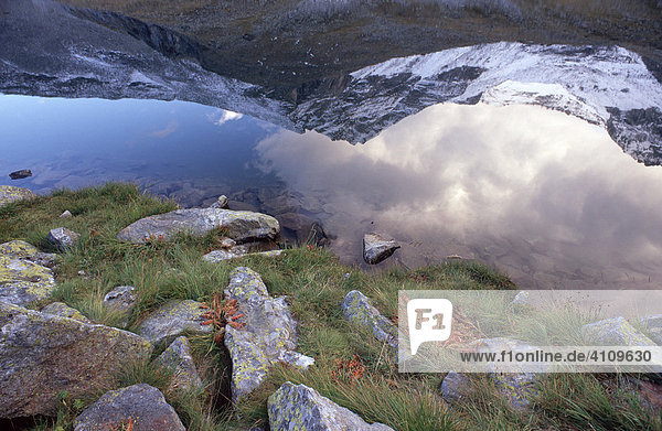Mountain reflected in Lanischsee lake Hohe Tauern Carinthia Austria