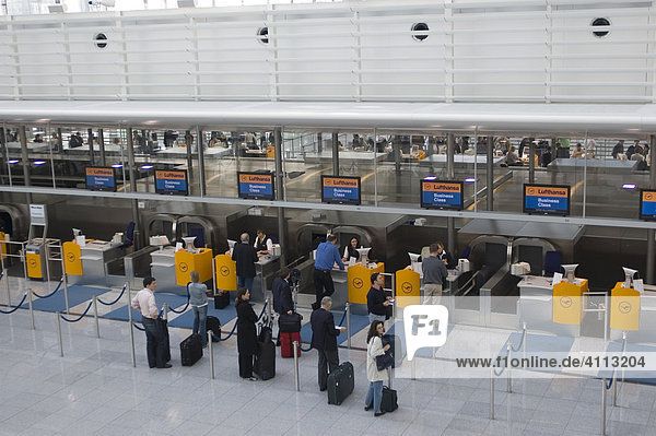 Counter with passenger on terminal  Airport Franz-Josef-Strauß  Munich  Bavaria  Germany