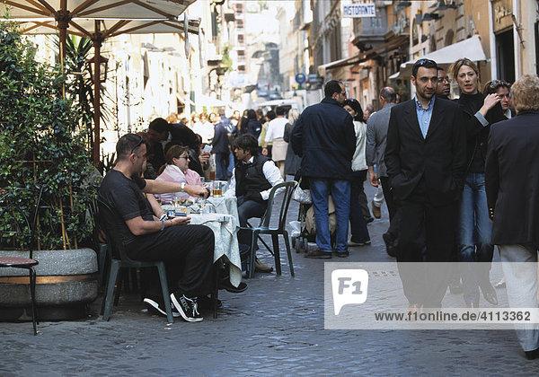 People walking the street  coffee shop  Rome  Italy