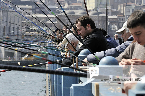 Fishermen on the Galata Bridge  Istanbul  Turkey
