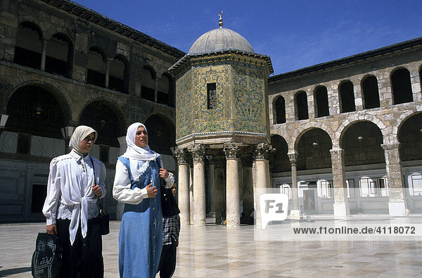 Two veiled women at the Umayyad Mosque or Grand Mosque of Damascus  Syria  Middle East